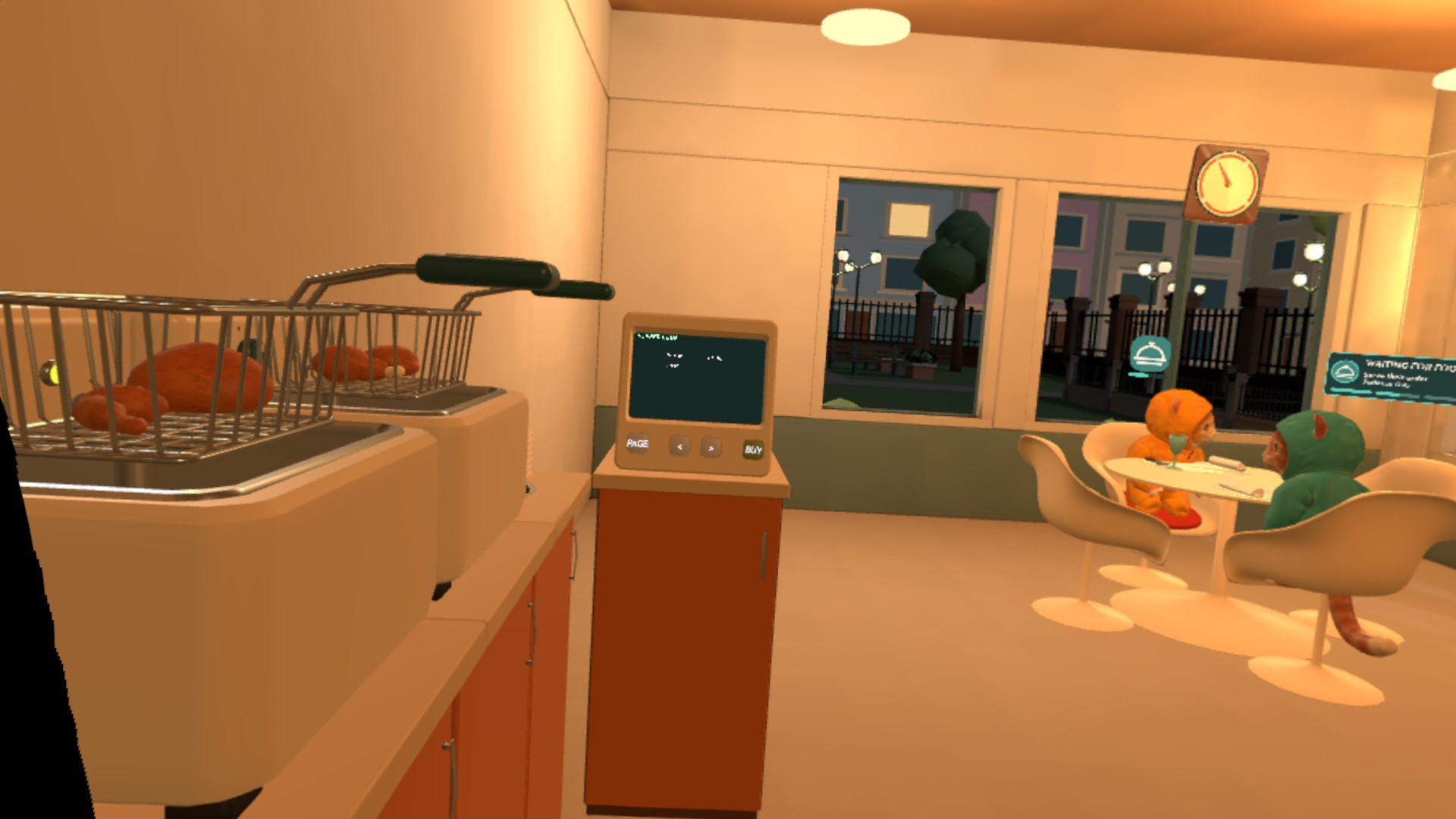 Fryers at the kitchen counter, with the dining room just beyond